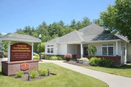 The entrance to the Oral Surgery Office of Saratoga County Oral & Maxillofacial Surgery Associates, PLLC with the office sign